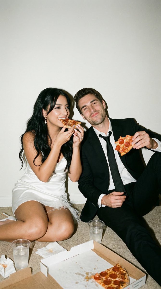 Flash Editorial After-Party Portrait of Couple Eating Pizza